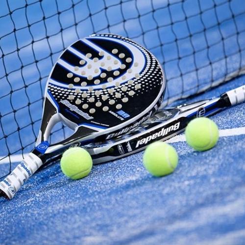 Padel players in action